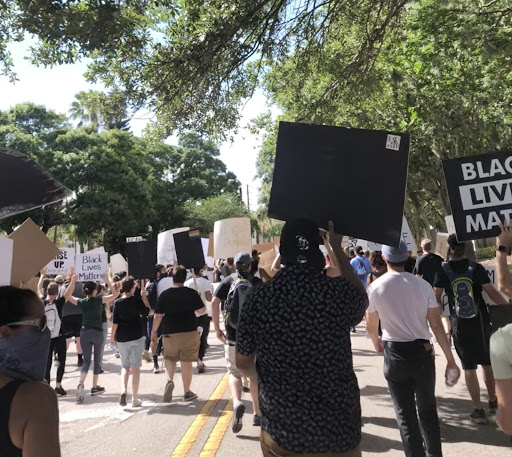 Protesters march down a Tampa street in the wake of George Floyd’s death.